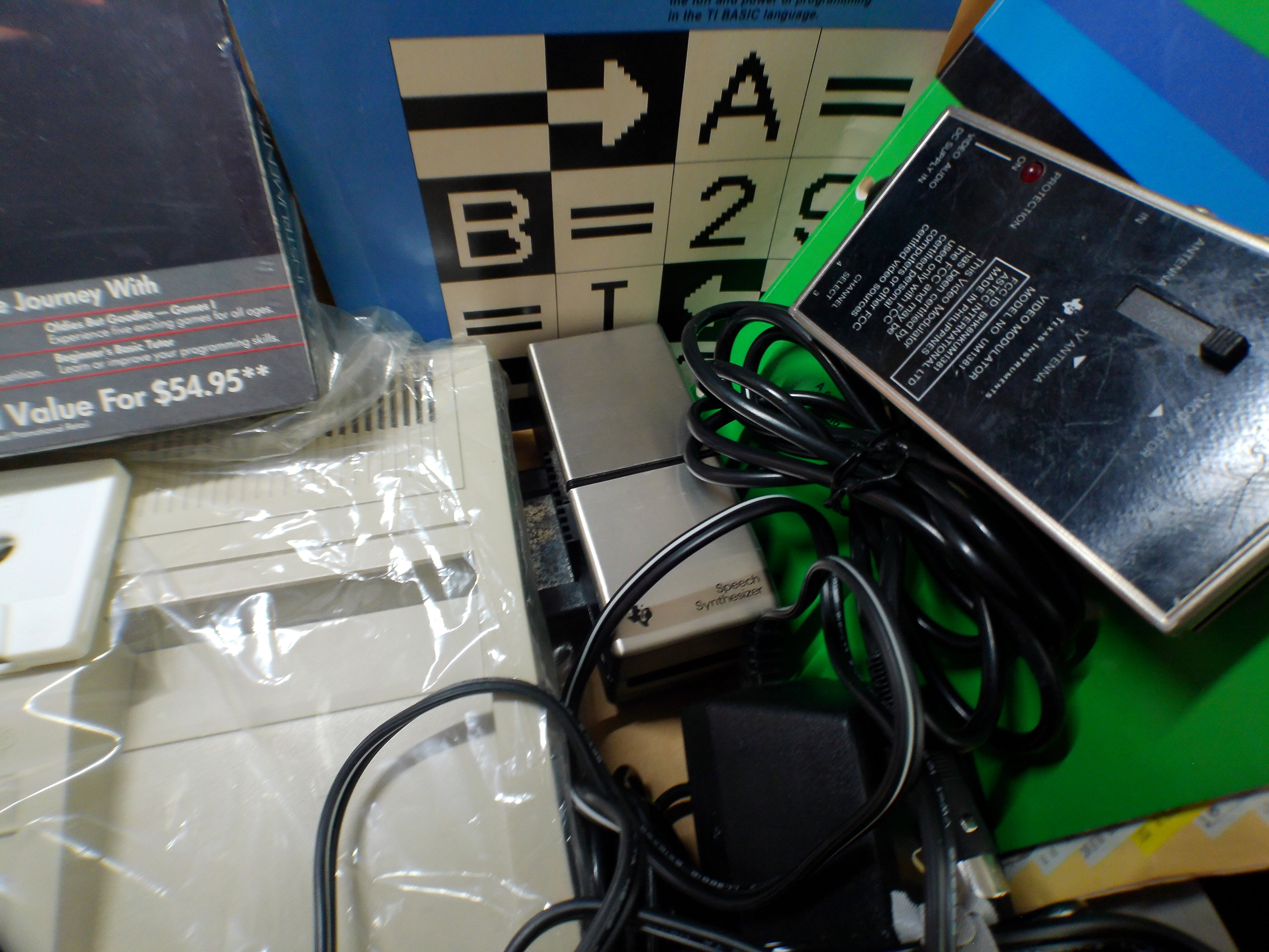 Texas Instruments TI-99/4A Complete Bundle — Boxed Console & Program Recorder, Speech Synthesizer, Sealed Software — Untested (As-Is)
