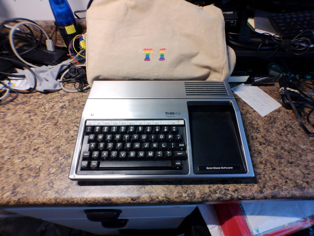 Texas Instruments TI-99/4A Home Computer with Dust Cover, Video Modulator & Joysticks — Untested (As-Is)