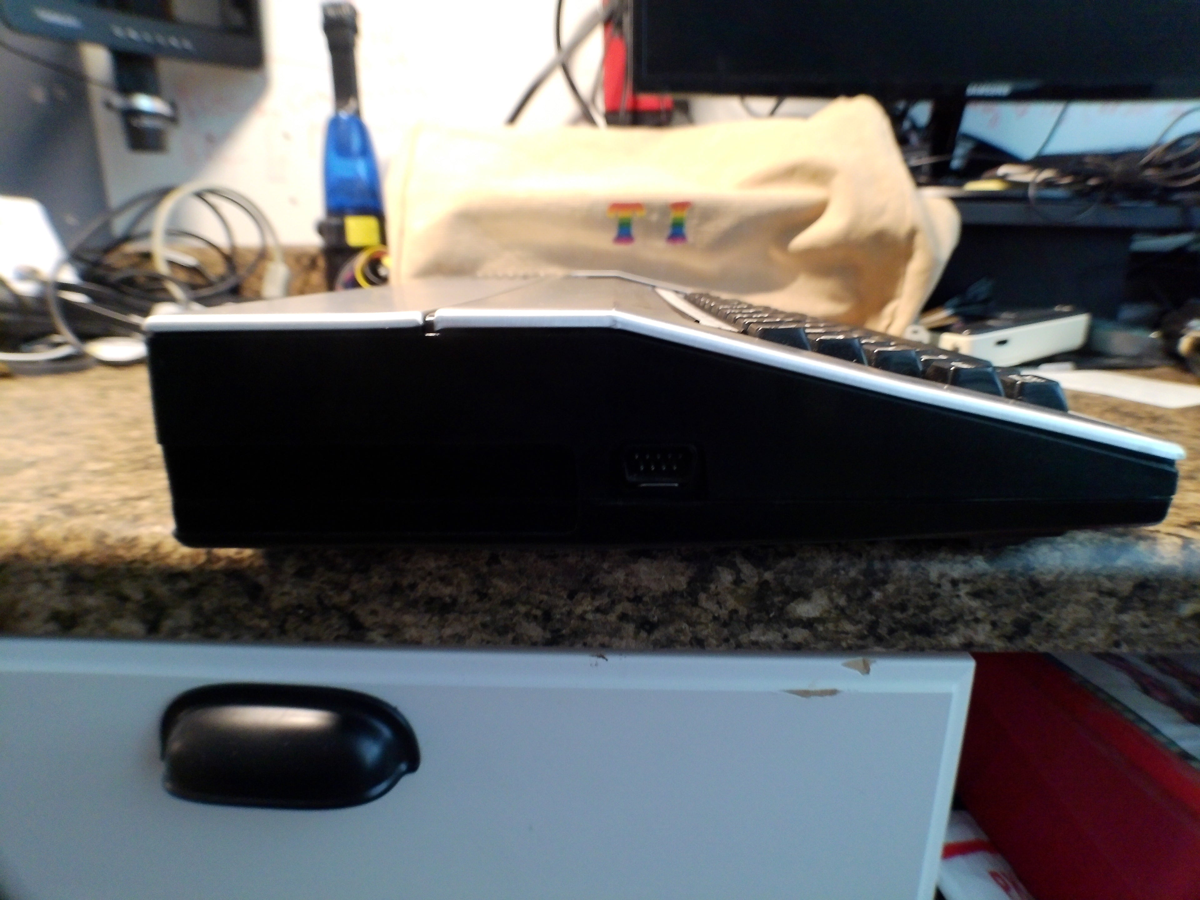 Texas Instruments TI-99/4A Home Computer with Dust Cover, Video Modulator & Joysticks — Untested (As-Is)