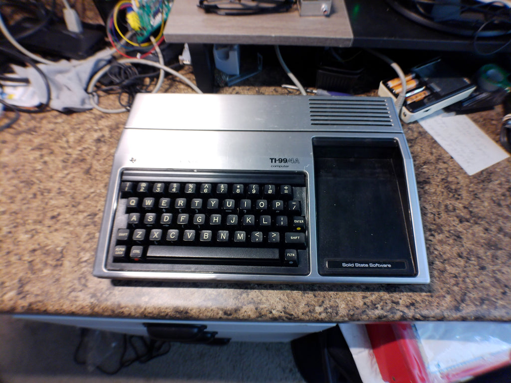 Texas Instruments TI-99/4A Home Computer with ~17 Game & Software Cartridges — Untested (As-Is)